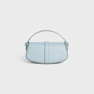 CLUTCH ON STRAP TABOU IN SMOOTH CALFSKIN ICE BLUE