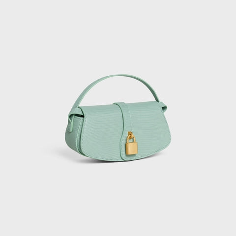 CLUTCH ON STRAP TABOU IN LIZARD VERT DE GRIS