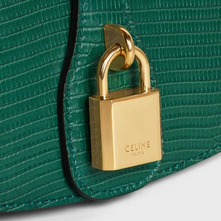 CLUTCH ON STRAP TABOU IN LIZARD PINE GREEN