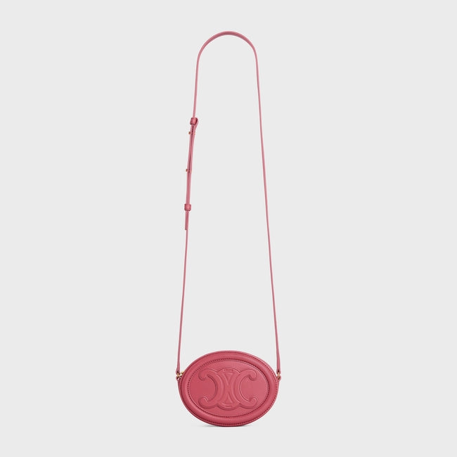 CROSSBODY OVAL PURSE CUIR TRIOMPHE IN SMOOTH CALFSKIN LIPSTICK