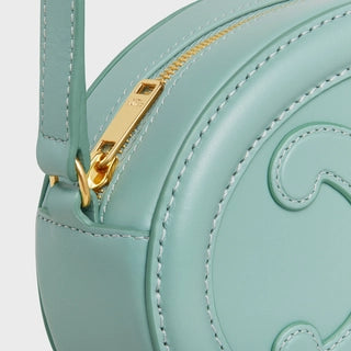 CROSSBODY OVAL PURSE CUIR TRIOMPHE IN SMOOTH CALFSKIN ICE MINT