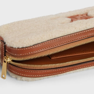 MINI CAMERA SHOULDER BAG CUIR TRIOMPHE IN SHEARLING AND CALFSKIN NATURAL / TAN