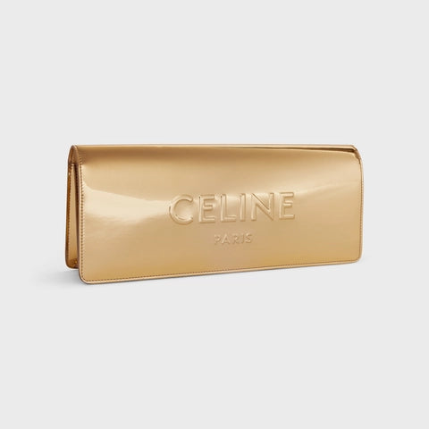 CELINE CLUTCH IN LAMINATED TEXTILE GOLD