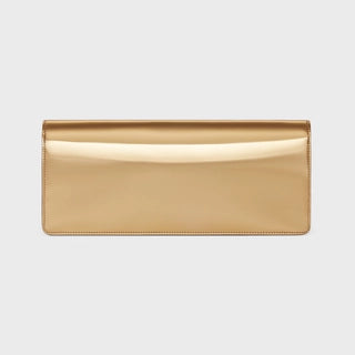 CELINE CLUTCH IN LAMINATED TEXTILE GOLD