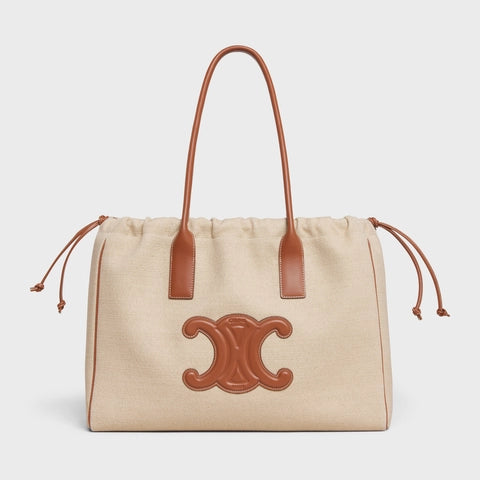 CABAS DRAWSTRING CUIR TRIOMPHE IN TEXTILE AND CALFSKIN NATURAL / TAN