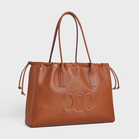 CABAS DRAWSTRING CUIR TRIOMPHE IN SMOOTH CALFSKIN TAN