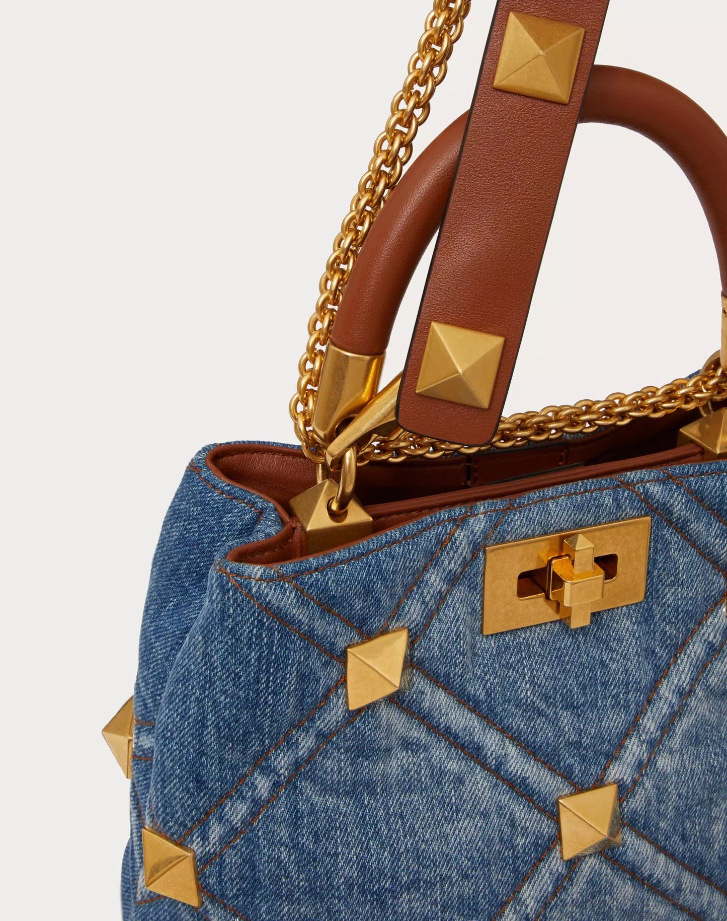 SMALL ROMAN STUD THE HANDLE BAG IN DENIM