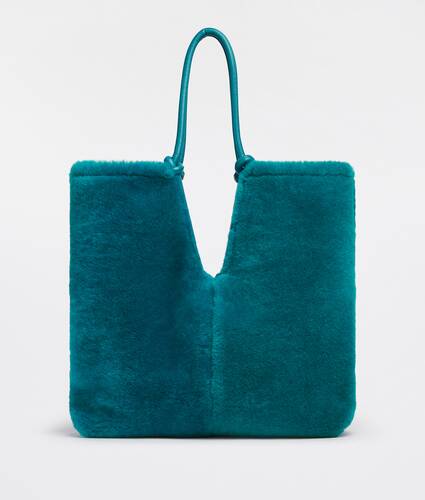 Reversible shearling tote bag