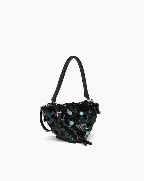 Sequin and leather handbag